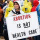 Anti-abortion protest outside the University of Michigan Stadium, May 2010
Bill Pugliano/Getty Images